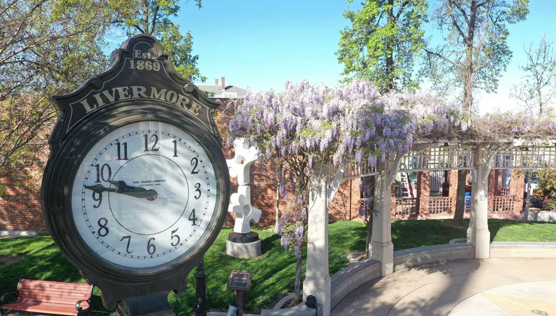 A clocktower that says Livermore above the face